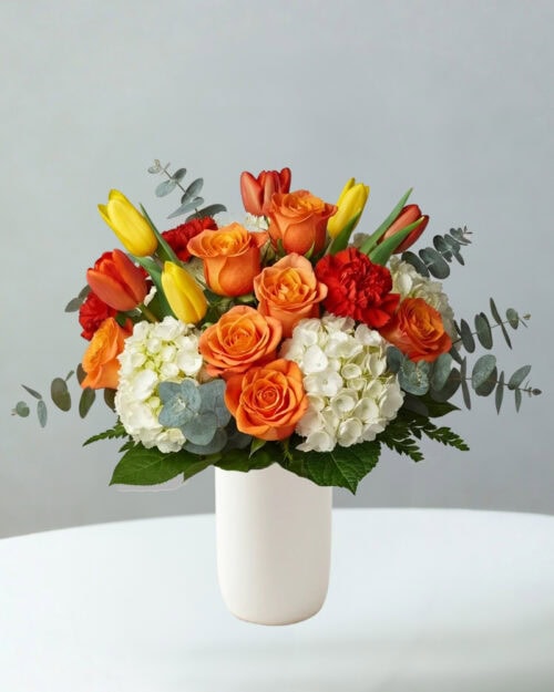 Orange Roses, Yellow Tulips, Red Carnations, White Hydrangea