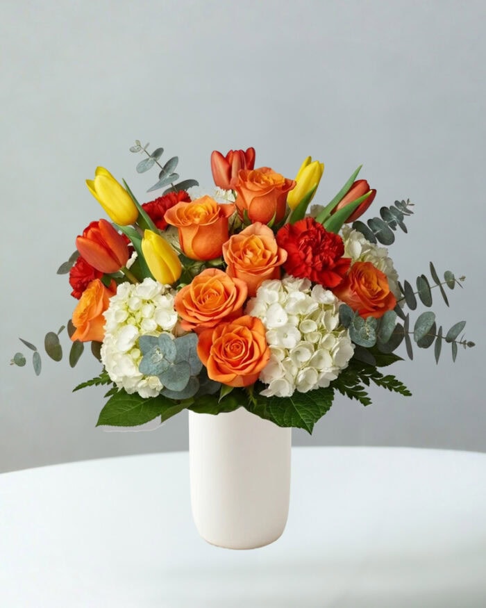 Orange Roses, Yellow Tulips, Red Carnations, White Hydrangea